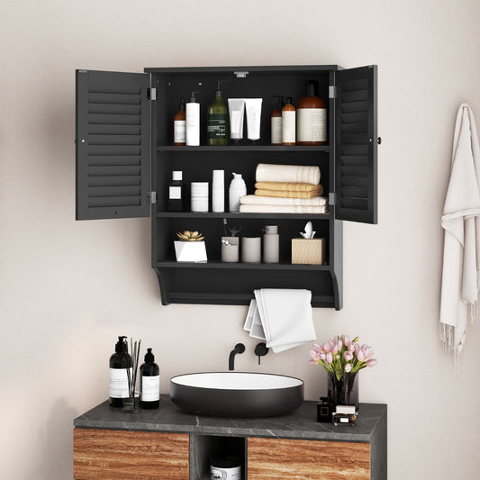 The wall cabinet filled with toiletries and towels in a bathroom setting