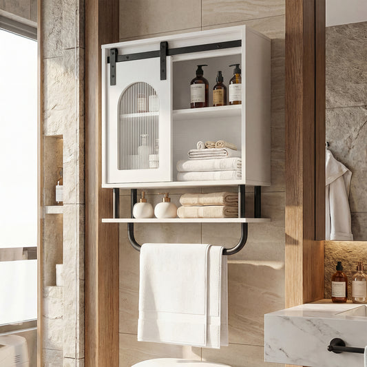 The white wall cabinet with sliding barn door is shown mounted above a toilet in a bathroom