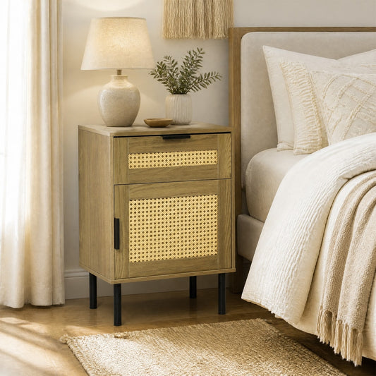 The natural wood bedside table with rattan detail in a bedroom setting