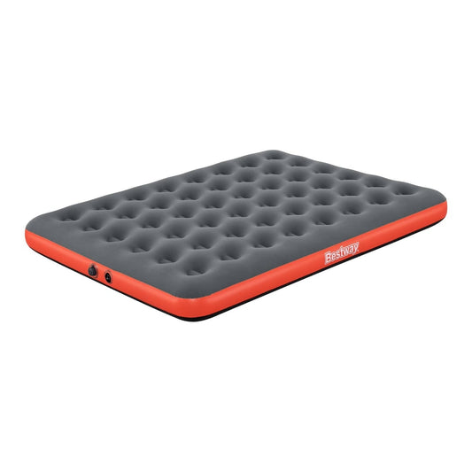 The air mattress showing the inflation valve on the side edge of the grey and red surface