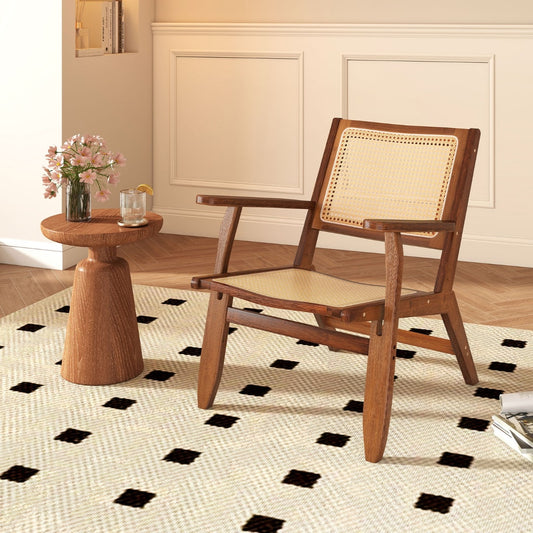 The accent chair placed in a bright living room next to a small wooden side table