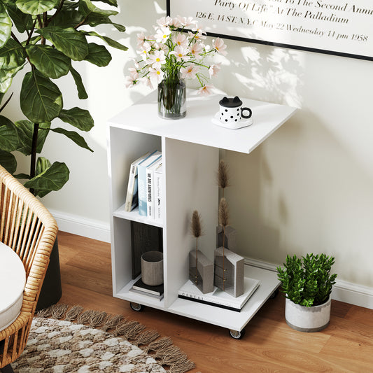 White C-shaped end table with storage shelves next to a sofa and plant