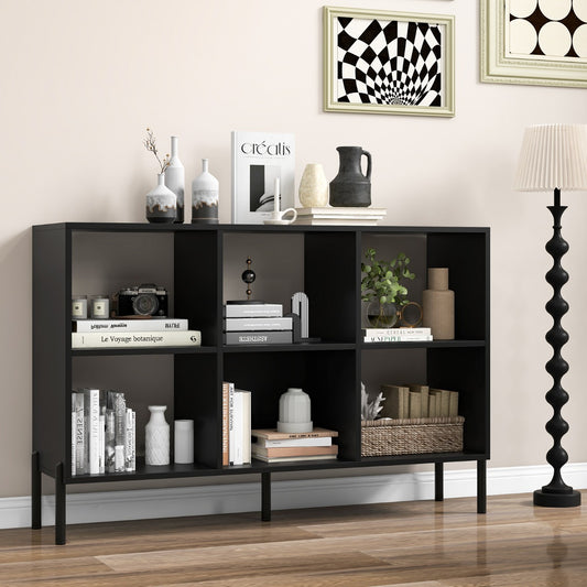 The black wooden bookcase is shown in a living room setting with decorative items