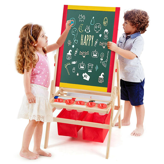 Two children drawing on the double sided art easel with storage bags