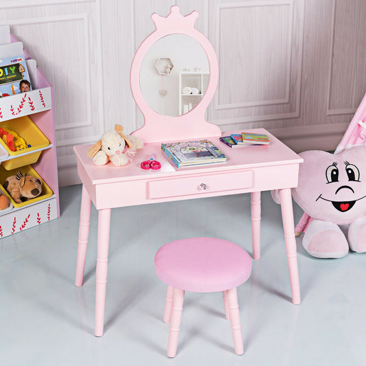 Pink kids vanity set with a stool in a child's bedroom with toys and a tent
