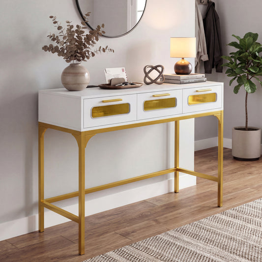 The hallway table styled with a lamp and vase in a bright modern living room setting