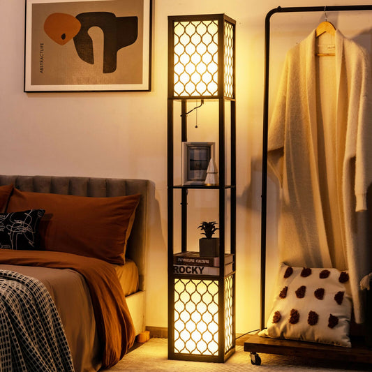 The floor lamp standing next to a bed in a warm bedroom setting with the light switched on