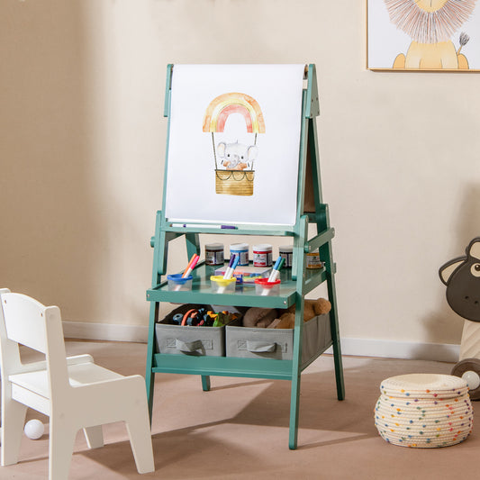 The art easel set up in a bright room with a paper roll and storage boxes underneath