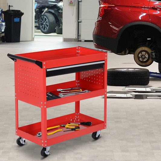 Red three-tier tool trolley cart with a drawer in a garage setting