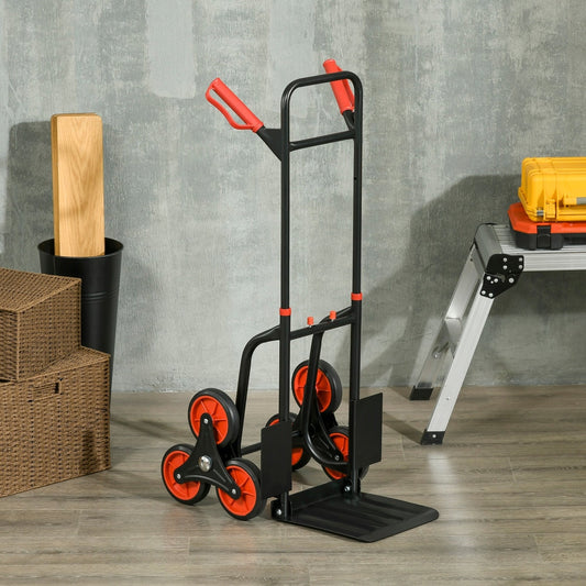 The red and black folding sack truck on wheels, positioned next to a bin and boxes