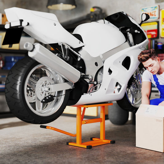 A white motorbike being lifted by the orange steel motorbike jack lift in a garage setting