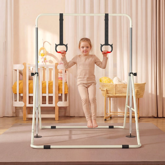 A young girl in beige clothing using the gymnastic bar with rings