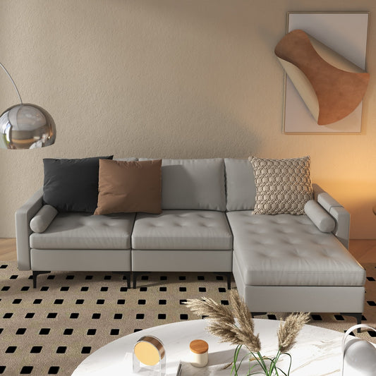 The L-shaped sofa in a living room with scatter cushions and a coffee table