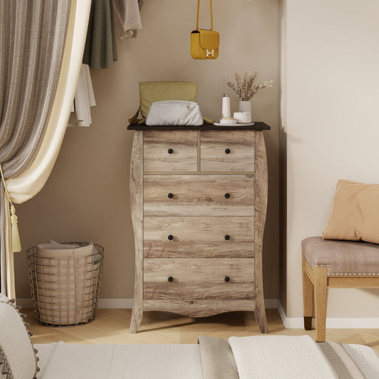 The wooden chest placed in a bedroom next to a curtain and a small stool with personal items on top