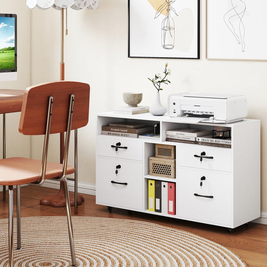 The white mobile filing cabinet is shown in a home office setting next to a desk and chair