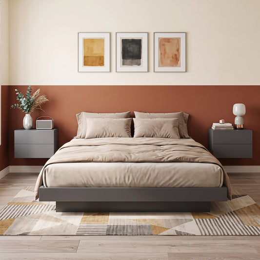 Two grey floating nightstands mounted on a wall either side of a bed