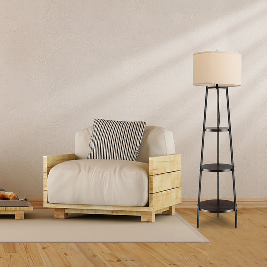 The floor lamp with shelves next to a wooden armchair in a living room