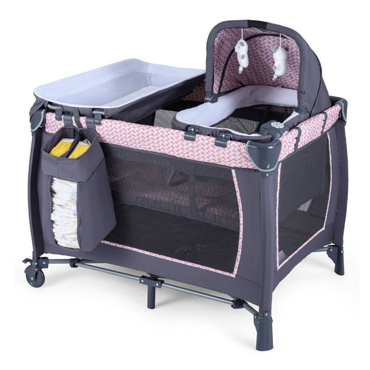 The light pink baby playard with rocking bassinet and changing table attached