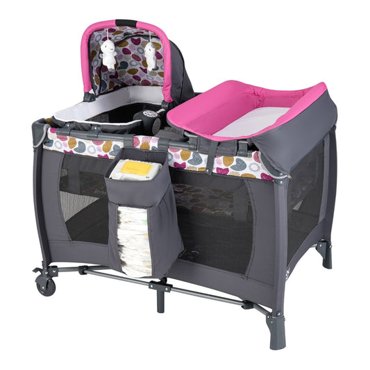 The portable baby playard with rocking bassinet and changing table attachment