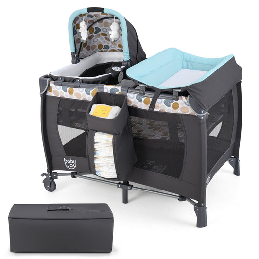 Blue baby playard with rocking bassinet, changing table and storage bag next to its folded carry case