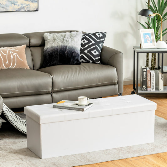 The shoe rack and storage bench is placed in a living room setting in front of a sofa