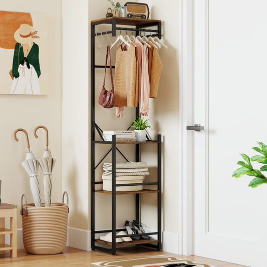 The hall tree placed in a corner next to a white door with clothes and accessories