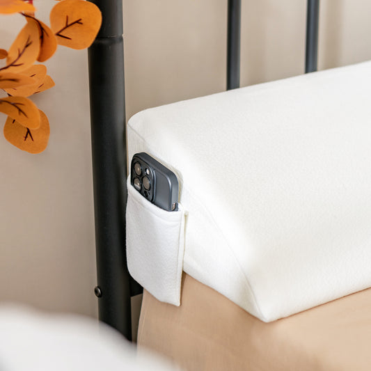 Close-up of the side pocket on the white bed wedge pillow