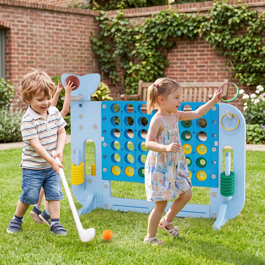 Children playing with the lawn games connect four set in a garden