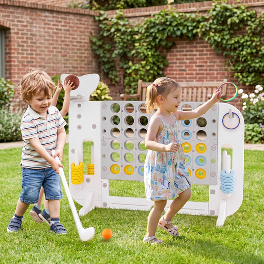 Children playing the lawn games set in a garden