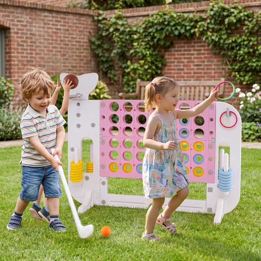 The lawn games set being used by children playing with a golf club and rings in a garden