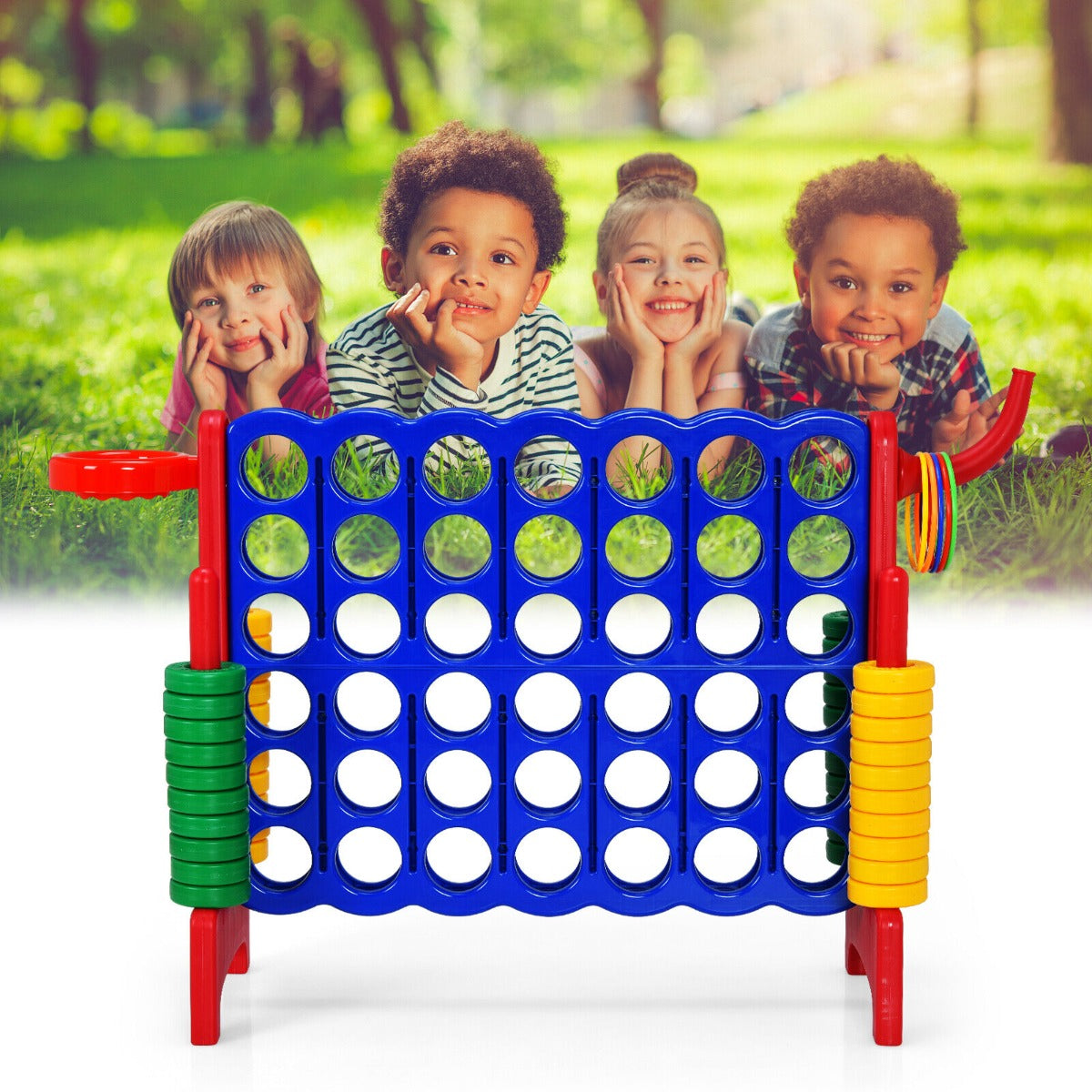 The lawn game positioned on green grass in front of four smiling children