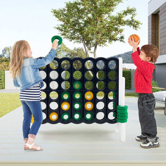Children playing the lawn game outdoors on a patio