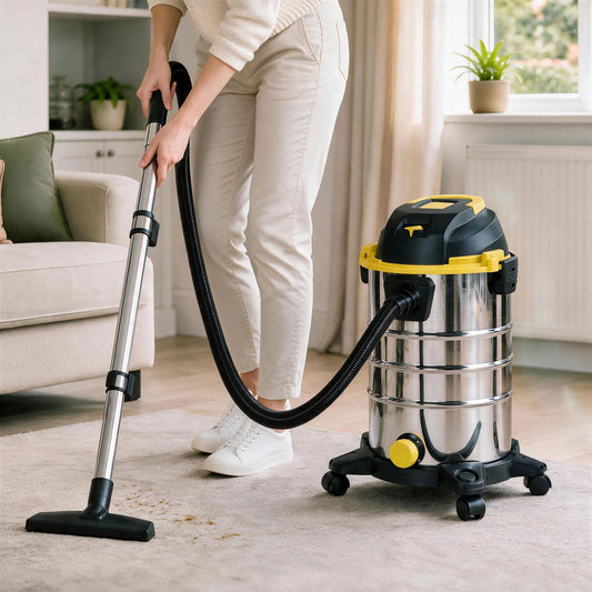 A person using the wet and dry vacuum cleaner to clean a carpet in a bright living room