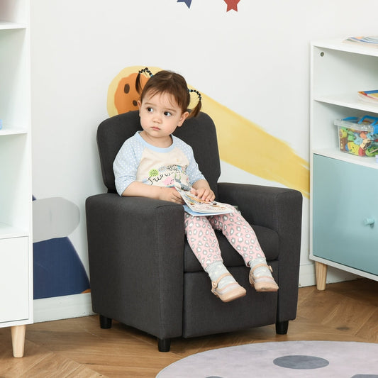 A young child sitting on the grey kids sofa armchair in a playroom