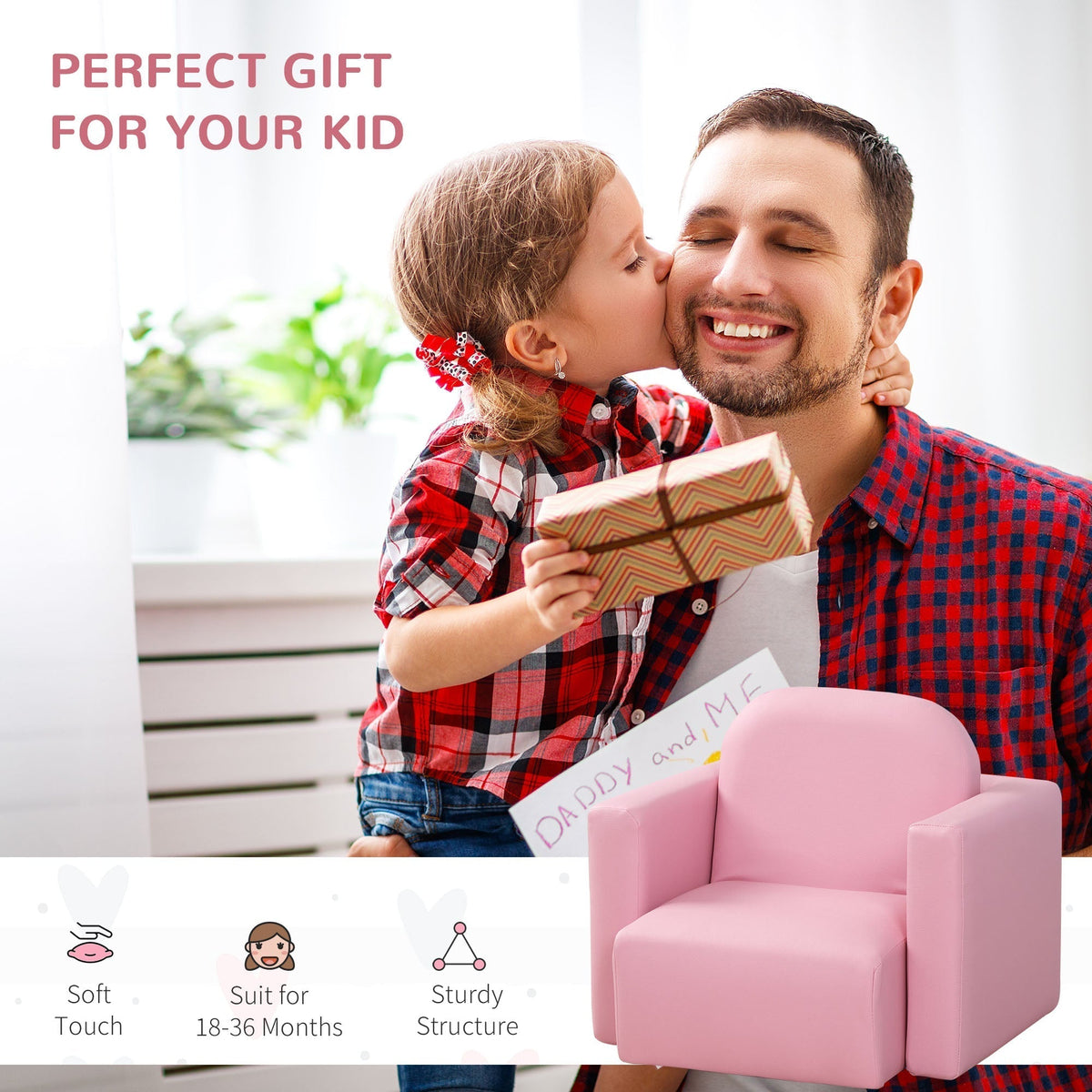 A father receiving a gift from his daughter, with the pink kids sofa chair nearby