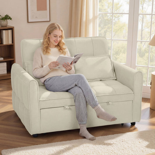 A woman reading a book on the light brown sofa bed in a living room setting
