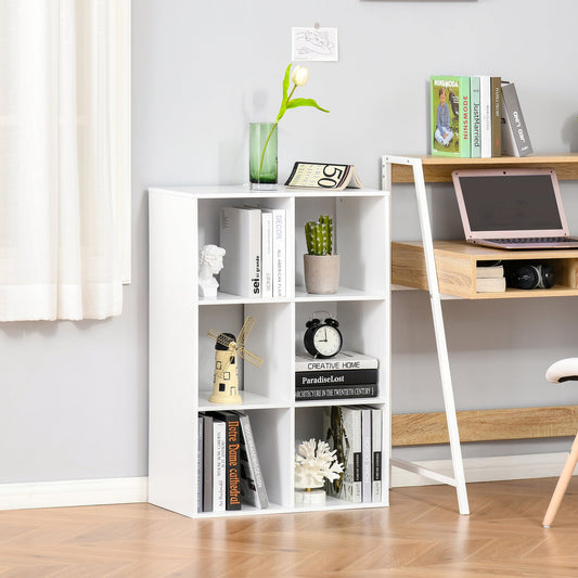 The white storage cabinet with six cube compartments, shown in a room with a desk and plant