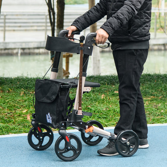 A person uses the four-wheel rollator with seat and back while walking outdoors