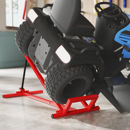 The mower jack lifting a ride-on lawn mower in a garage workshop setting