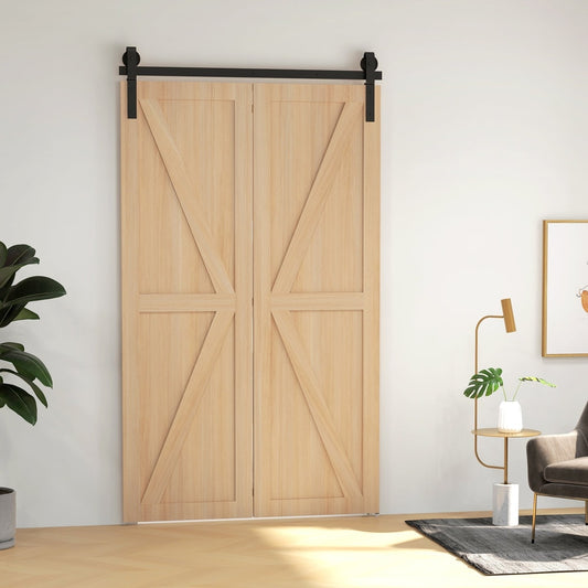 The bi-folding sliding barn door hardware track kit installed on a double wooden door in a room