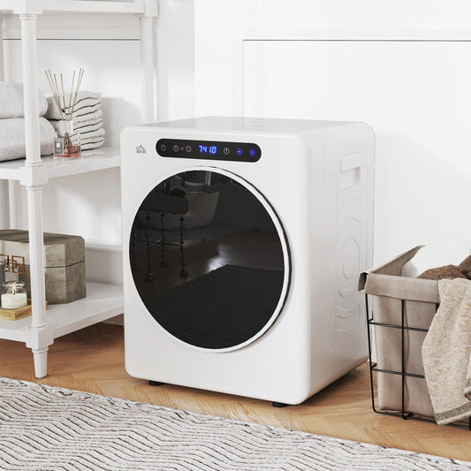 White compact tumble dryer in a domestic setting next to a shelf unit and laundry basket