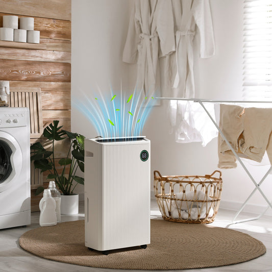 The portable dehumidifier in a laundry room, with clothes drying on a rack and a washing machine nearby