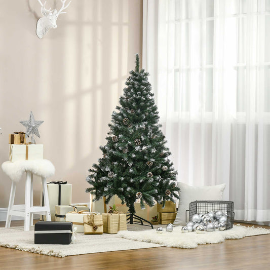 the artificial christmas tree decorated with pine cones in a bright living room setting