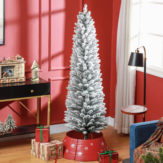 The snowy pencil Christmas tree is set up in a festive room with presents around its base
