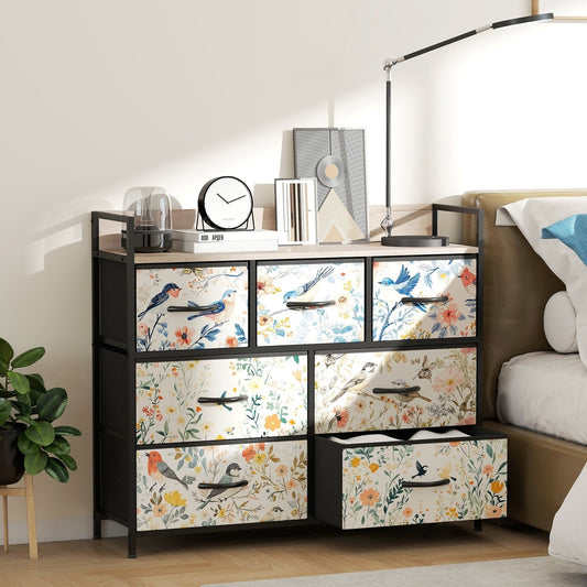 The chest of drawers in a bedroom setting next to a bed and plant