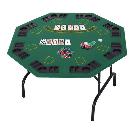 The card games table set up with playing cards and stacks of colourful poker chips