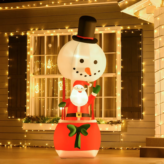 The Christmas inflatable decoration is lit up at night on a porch