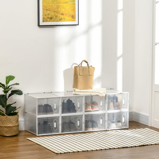 Eight clear plastic shoe storage boxes stacked and filled with shoes in a domestic setting