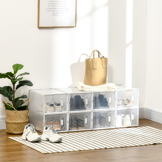 the shoe storage boxes arranged in a low row on a rug with various footwear inside