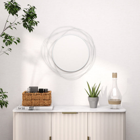 The wall mirror mounted above a white sideboard in a bright living room setting
